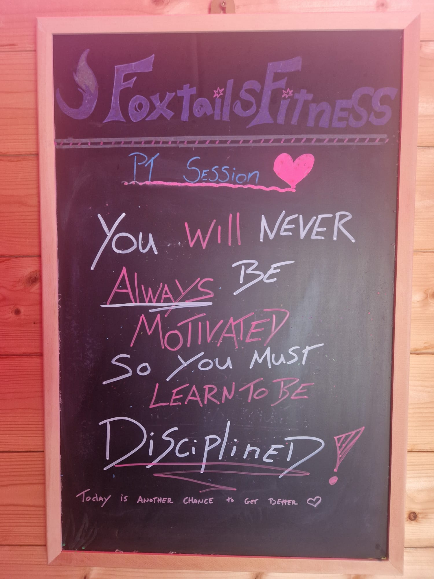 Foxtail Fitness motivation board with a discipline quote